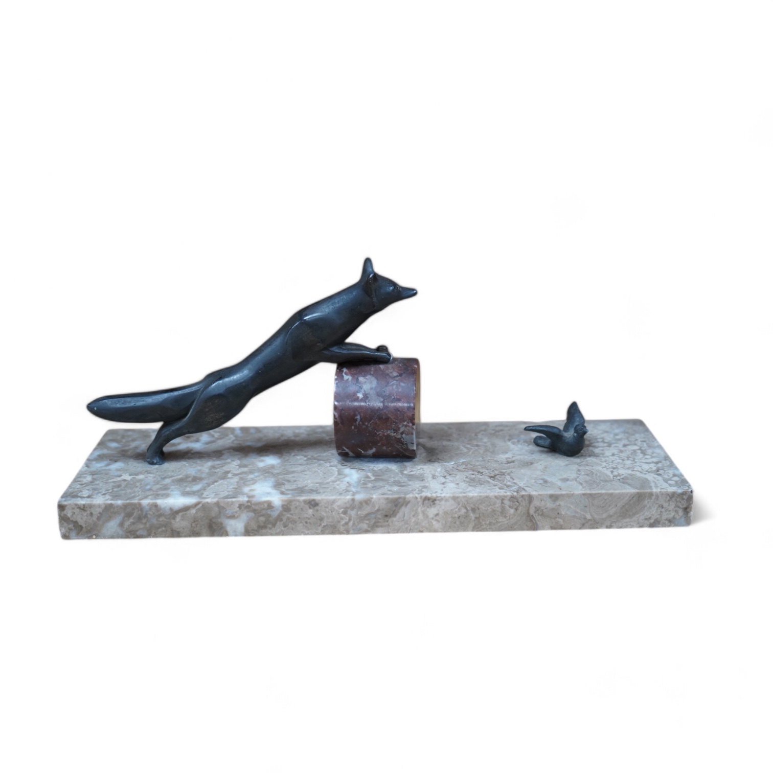 An Art Deco marble and spelter sculpture of a fox and dove, 29cm wide. Condition - fair